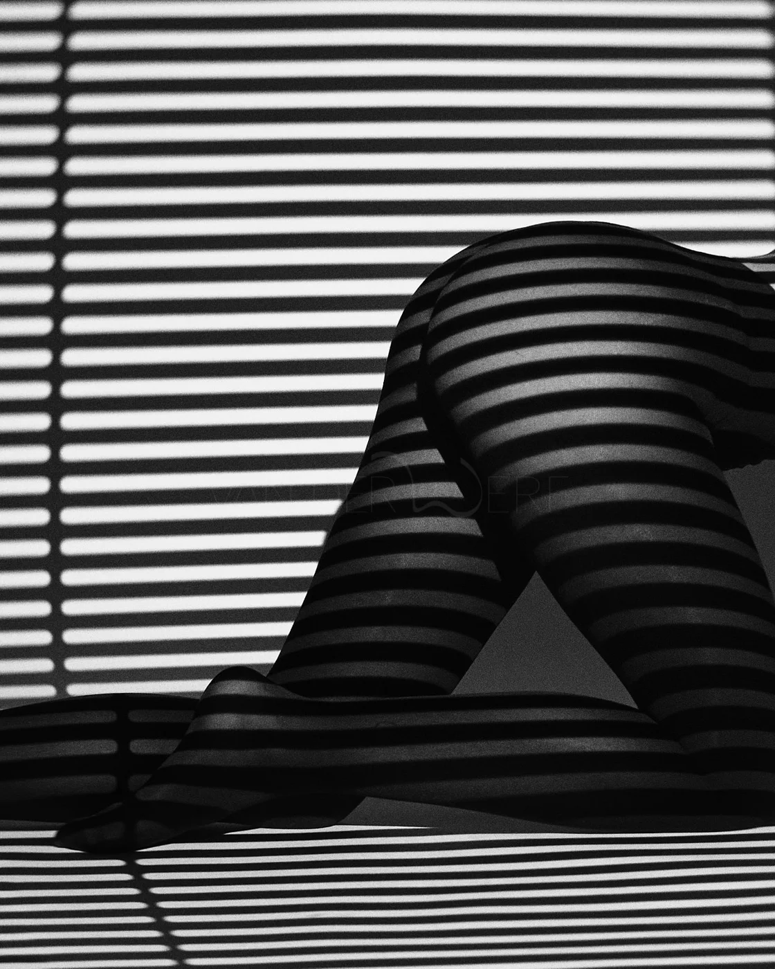 Silhouette of a person sitting against a background of horizontal striped blinds, creating a shadow pattern on their body.
