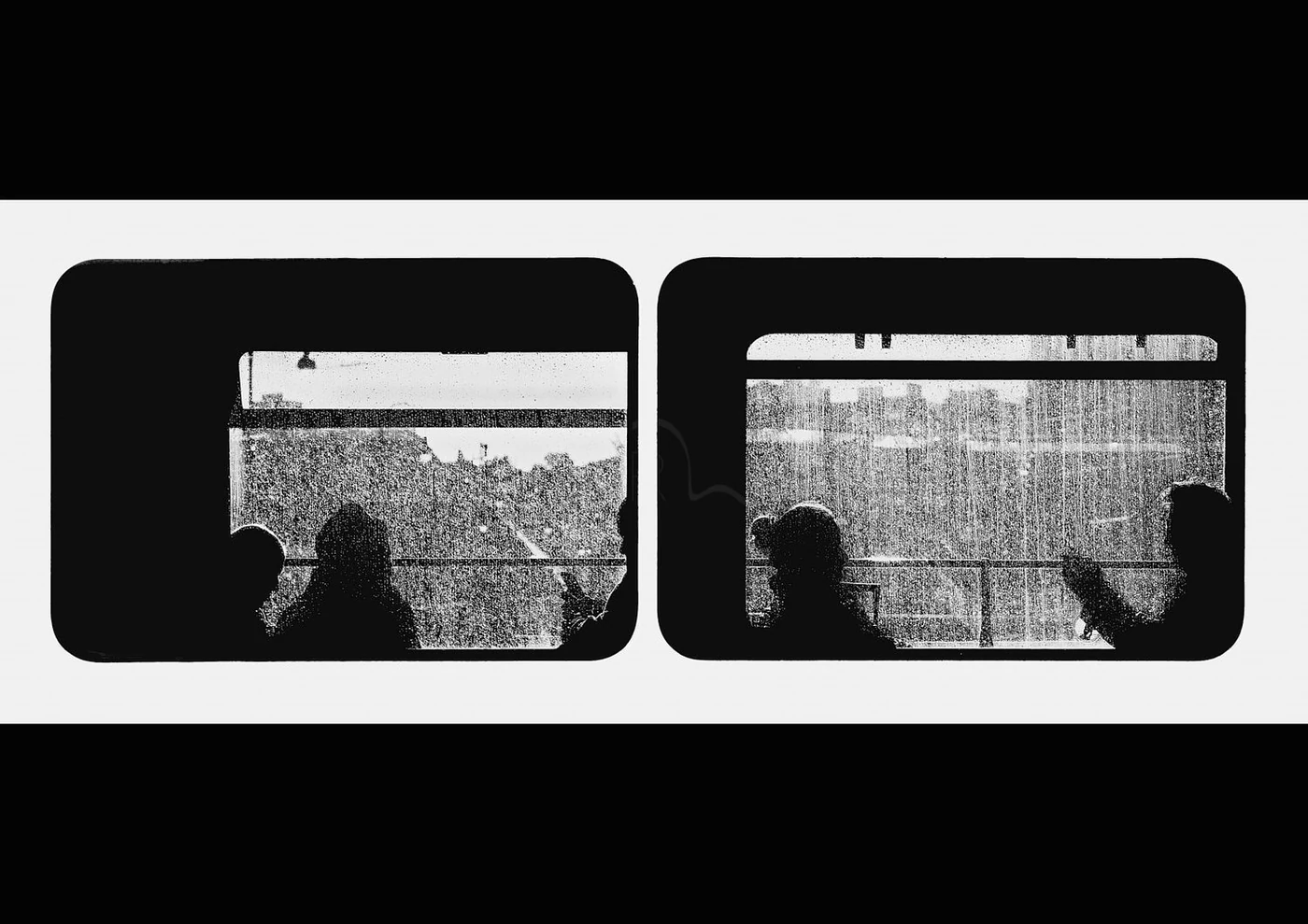 Silhouettes of people seated on a train viewed through rain-streaked windows.