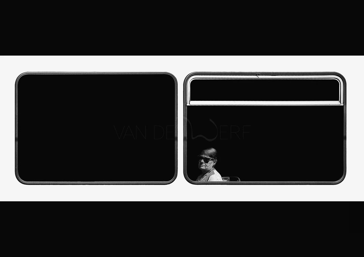 Black and white image of two train windows, a woman with sunglasses and patterned shirt is visible through the right window, with the left window showing a dark interior.